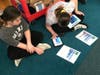 BMS students work on coding their name into snowflakes at the Hour of Code event.