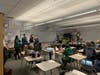 Mary Immaculate College teacher candidates visit an eighth grade advisory class on Thursday, Jan. 9.