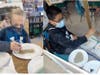 Evie (left) and Allan, fifth graders at the Dale Street School, complete a hands-on activity as part of a chemical reactions and mixtures kit provided by nonprofit Science & Engineering Education Development and funded by the Mass Cultural Council.