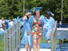 Alessandra Kelley, Nicole Mulready and Maria Neafus leaving the stage after singing the National Anthem.