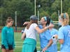 Team Captains presenting Maddy with gifts