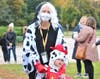Cruella, i.e., Memorial School Principal Bilsborough and her little Dalmation