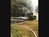 Fighting structure fire in Medfield