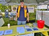 Lion Brian Flynn working at the Lions Raffle/Info booth