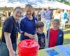 Patrons at the Raffle Lions Booth on Medfield Day