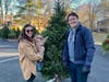 Happy Customers after choosing their perfect Lions Christmas Tree!