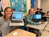 Seventh grade English teacher Amy Cuomo (left) and student Malachy McAteer learning JavaScript during Blake Middle School's Hour of Code.
