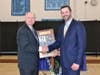 Superintendent Jeff Marsden congratulating Bob Meaney