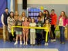 Front row: Addie Godfrey, Grace Riley, Dylan Langenburg, Margo Pickering, Nolan Allen, and Gabreille Varela Back row:  Superintendent Marsden, Christine Powers, Sarah Hevey, Holli Caulfield, Liz Whitcher,  Liz Brothers, Katie Morray and Kerry Cowell. 