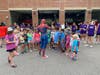 Campers surrounding Spider-Man