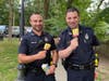 MPD Officer Plant and MPD Officer Moses enjoying Sponge Bob Ice Cream