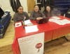 Sixth-graders Selena Urena-Gonzalez (left), Shelby Jones (center) and Cecilia Mendonca, members of the Blood Drive Committee, assisted at the registration table