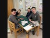 8th grader Joseph Callender (front left), 6th grader Tyler Frank (back left), 8th grader Adrian Chin (back right) and 8th grader Joe Konopka (front right), members of the Blood Drive Committee, assisted in the childcare area and watched 10 kids.