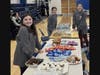 From left: sixth-graders Anna Cawley, Averi Urquhart and Alexa Dagata, members of the Blood Drive Committee, assisted at the refreshment and recovery area. Fresh-baked goods were also available to donors at the table.