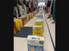 About 430 cereal boxes were used to create a domino maze in the sixth-grade hallway.