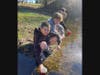 Front to back: Students Owen Kelly, Tyler Marshall,Teddy Molloy, and Joe Kidd release trout into the Charles River on April 8th.

