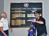 (left to right) Legion Commander Bob Tannler and Jr Vice Commander, Jean Oullette unveil the Medfield Gold Star Veterans Plaque