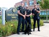 MPD Officer Rob Hain, MPD Officer Timothy Reilly, MDP Sgt. Francis Thisse with Canine Officer, Nova.