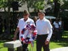Commander Bob Tannler and Jean Ouelette placing wreat at Memorial at Baxter Park