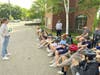 Assistant Town Administrator/Public Information Coordinator Brittany Franklin spoke to a group of Thomas Blake Middle School students during a stop on the Eighth Grade Bike Trip in late May. 