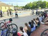 Medfield Town Clerk Marion Bonoldi spoke to a group of Thomas Blake Middle School students during a stop on the Eighth Grade Bike Trip in late May. 