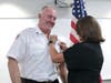 Captain/EMT Scott Donahue being pinned by his wife
