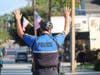 Medfield Police Sgt. Rob Hain directing traffic an Pan Mass Riders
