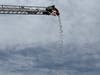 FF Tuckerman dropping the golf balls off the end of the ladder truck at the Golf Ball Drop.