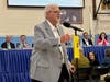 Jerry Kazanjian giving a plug for the 375th parade during a quite moment at Town Meeting