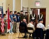 MHS Band (Taps) Mason Allan, Robert Cabezud and Nash Ten Hagen with the US Army Color Guard.