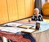 June Doucette Burr with memorabilia of Phil Burr's Korean War time