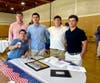 Senior boys reading about Phil Burr