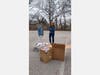 Veterinary Nursing Program Director Kathy Koar and daughter delivered supplies for a handoff to Einstein. 