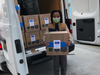 DCMO's Everyone Deserves A Mask Campaign Ambassador, Malon James (10) helps deliver masks.