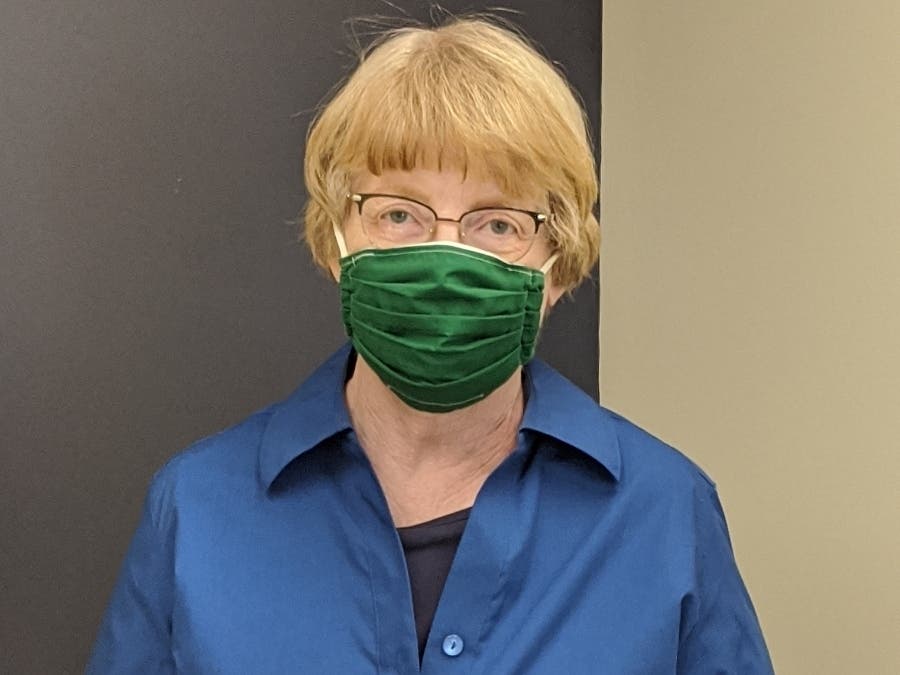 Beth Roth with her mask from Mask of Hope.