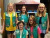 Girl Scout Troop 4894 with their cabinet