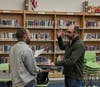 Gregory Queen being sworn in by Judge Scott.