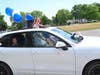 Sylvia Marks of Manchester arrived on campus in her family's decorated car.