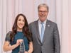 Lakeland Bank’s Victoria Duffin stands with Tom Shara, President and CEO of Lakeland Bank as she accepts the NJBankers 2019 Rising Star Award.
