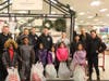 Glen Cove Police Officers treat GCBGC members to a winter wonderland shopping spree.  