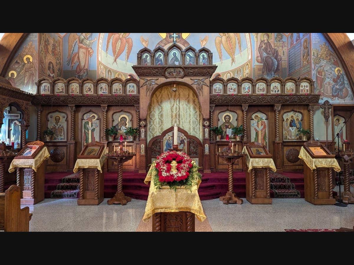 The Iconostasis (icon screen) before the altar at Holy Trinity Church.  It shows our unity with Christ and all the angels and saints.