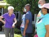 Ruth Lang, Grace Point Place resident, reminisces about golf with new friends from AERO Special Education Cooperative.