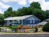 Capitol Vanira Apartments' playground, building and pavilion.