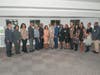 Many City of Stockbridge officials and the Russell siblings, Donata Russell Ross, H. Jerome Russell, Jr., Michael B. Russell, and EVP, General Counsel, Yasmine Murray (black and white skirt)