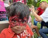 Face painting was popular at 9th Annual Community Resource Fair at Campagnone Park in Lawrence in August 10.