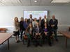 Back row, left to right: GLCAC’s Director of Immigration Legal Services Astrid Paniagua, former State Rep. and GLCAC Board Member Christina Minicucci, GLCAC Division Director for Housing and Community Services Kretcha Roldan, 