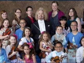 Pictured center: Kirk Muspratt, New Philharmonic Music Director and Conductor