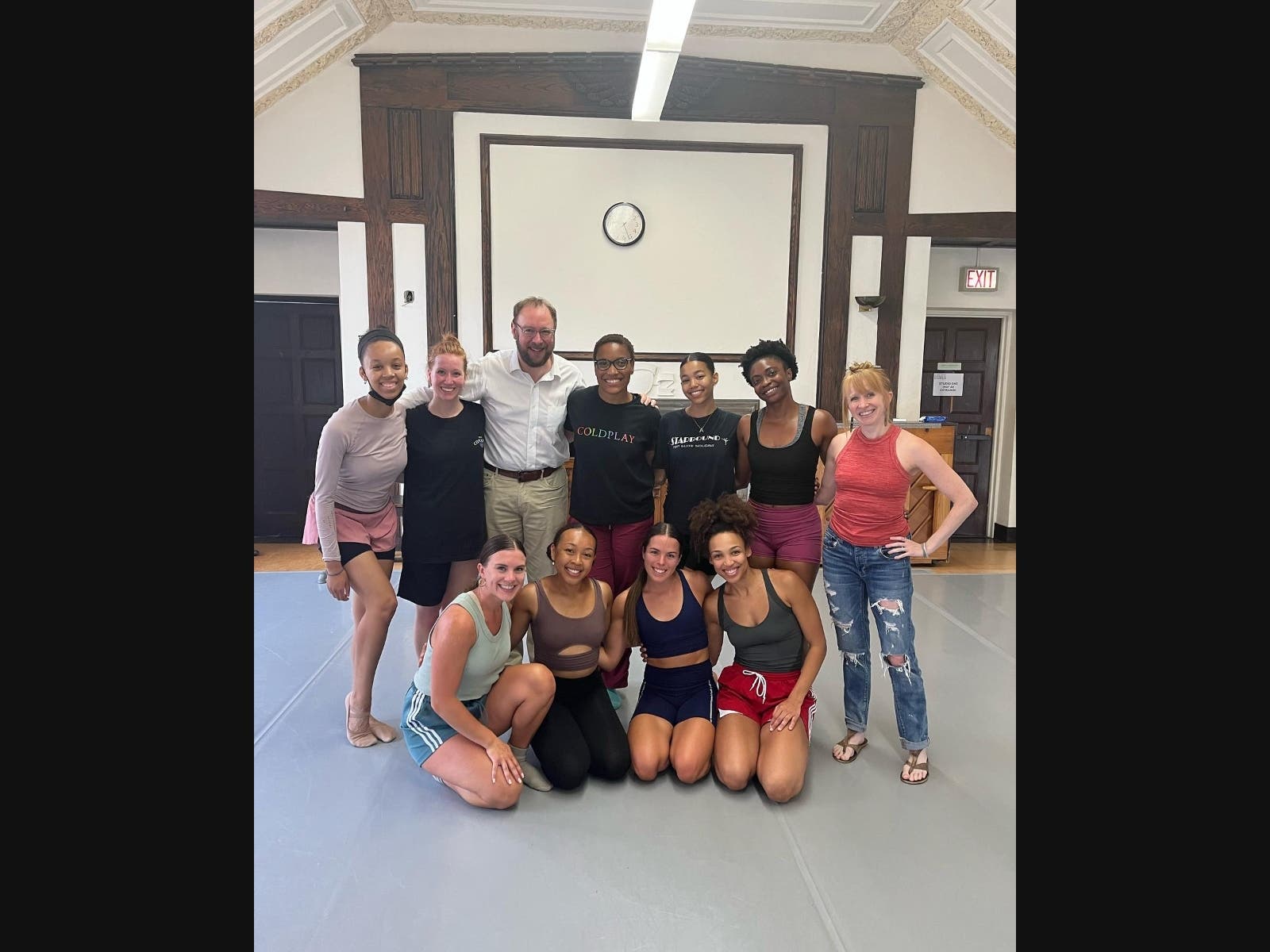 MOB's Declan McGovern-3rd from L- poses with Kia Smith 4th from L and SCDT dancers  in rehearsal. 