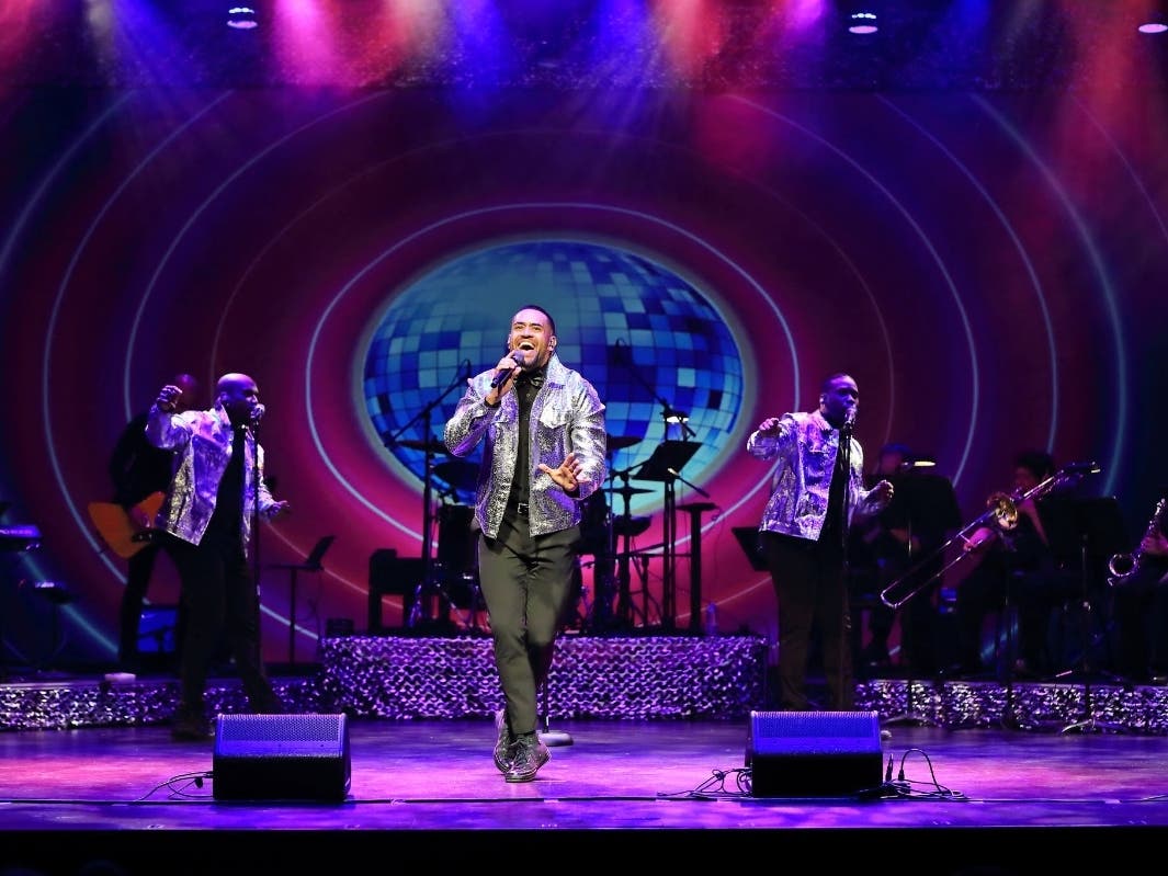 Pictured: Uptown in concert
