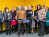 (Center of Group): L-R, DeKalb County Commissioner Larry Johnson, Scottdale Early Learning Board Chairman Cynthia Livingston  and Scottdale Early Learning President and CEO Maryum Gibson are joined by SEL board members and supporters at SEL's opening. 